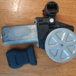 Front left driver's side window motor. C1A7
